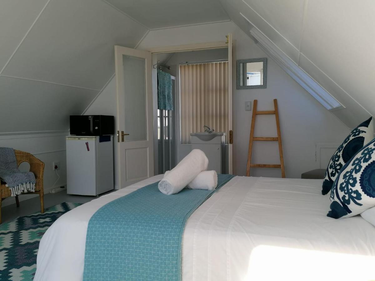 Quarto em Acomodações Particulares Llamedos Loft With Sea View Langebaan